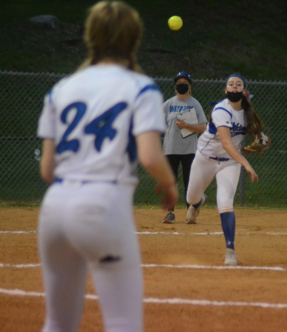 Valley Central third baseman Sarah Congelosi throws the ball across the diamond to first baseman Emilia Brundage during Wednesday’s OCIAA softball game.